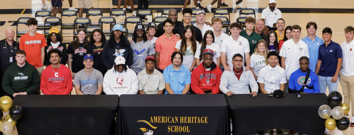 Athletes pick up the pen and sign to college